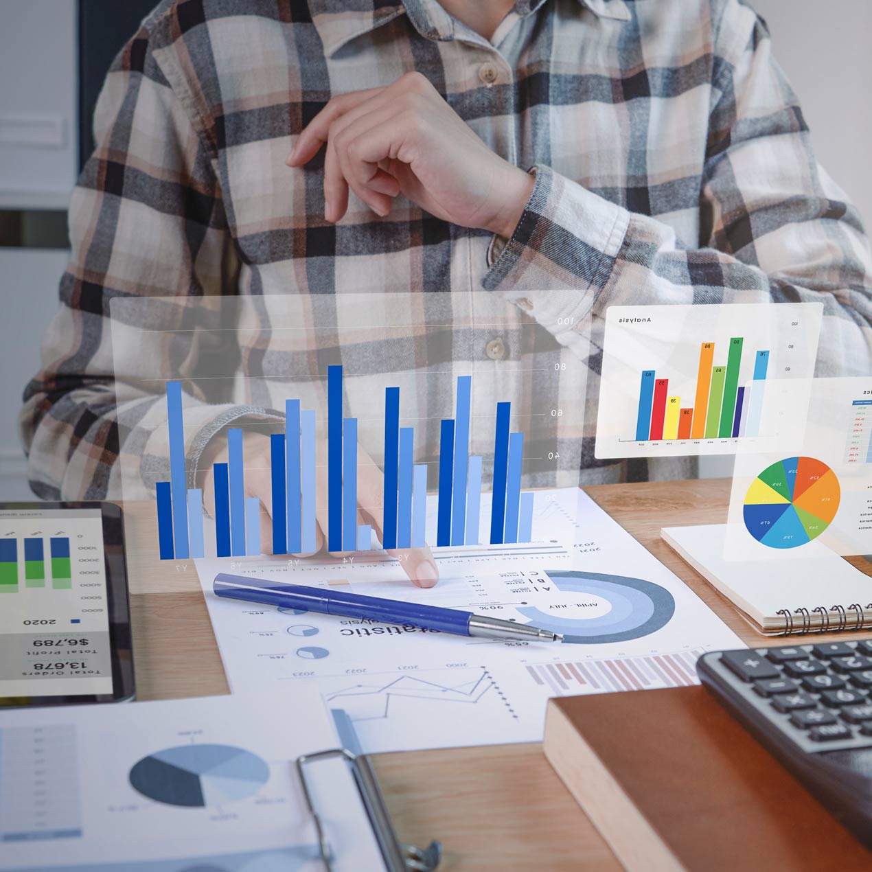 man plotting accounting and earnings charts